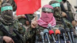 Abu Ubaida (C), spokesman of the Ezzedine al-Qassam Brigades, the military wing of the Palestinian Islamist movement Hamas, speaks during a memorial in the southern Gaza Strip town of Rafah on January 31, 2017, for Mohamed Zouari, a 49-year-old Tunisian engineer and drone expert, who was murdered at the wheel of his car outside his house in Tunisia in December 2016. 
The armed wing of Hamas said that the Jewish state was responsible for the murder in eastern Tunisia, of Mohamed Zaouari, described as a leader of the Islamist movement specializing in the development of drones. / AFP / SAID KHATIB        (Photo credit should read SAID KHATIB/AFP via Getty Images)