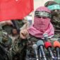 Abu Ubaida (C), spokesman of the Ezzedine al-Qassam Brigades, the military wing of the Palestinian Islamist movement Hamas, speaks during a memorial in the southern Gaza Strip town of Rafah on January 31, 2017, for Mohamed Zouari, a 49-year-old Tunisian engineer and drone expert, who was murdered at the wheel of his car outside his house in Tunisia in December 2016. 
The armed wing of Hamas said that the Jewish state was responsible for the murder in eastern Tunisia, of Mohamed Zaouari, described as a leader of the Islamist movement specializing in the development of drones. / AFP / SAID KHATIB        (Photo credit should read SAID KHATIB/AFP via Getty Images)
