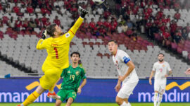 Indonesia's goalkeeper Maarten Vincent Paes (L) jumps to catch the ball during the 2026 World Cup Asian qualification football match between Saudi Arabia and Indonesia at Bung Karno Stadium in Jakarta on November 19, 2024. (Photo by BAY ISMOYO / AFP) (Photo by BAY ISMOYO/AFP via Getty Images)