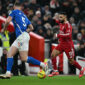 Liverpool's Egyptian striker #11 Mohamed Salah runs with the ball during the English Premier League football match between Liverpool and Sunderland at Anfield in Liverpool, north west England on December 3, 2025. (Photo by Paul ELLIS / AFP via Getty Images) / RESTRICTED TO EDITORIAL USE. No use with unauthorized audio, video, data, fixture lists, club/league logos or 'live' services. Online in-match use limited to 120 images. An additional 40 images may be used in extra time. No video emulation. Social media in-match use limited to 120 images. An additional 40 images may be used in extra time. No use in betting publications, games or single club/league/player publications. /
