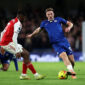 LONDON, ENGLAND - NOVEMBER 30: Liam Delap of Chelsea controls the ball whilst under pressure from Cristhian Mosquera of Arsenal during the Premier League match between Chelsea and Arsenal at Stamford Bridge on November 30, 2025 in London, England. (Photo by Chris Lee - Chelsea FC/Chelsea FC via Getty Images)