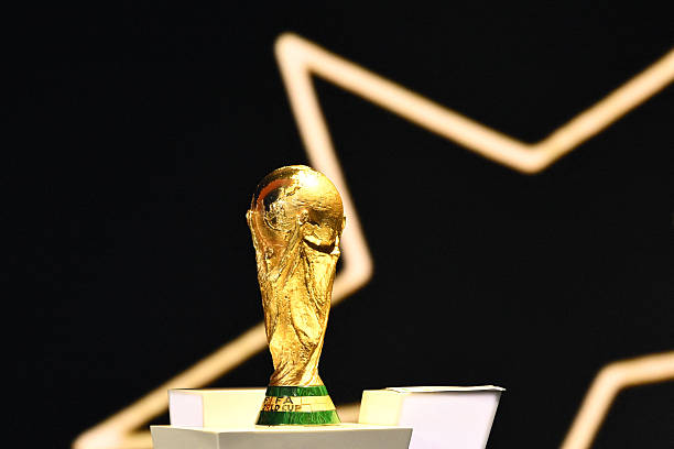 The FIFA World Cup Trophy is displayed on the stage during the draw for the 2026 FIFA Football World Cup taking place in the US, Canada and Mexico, at the Kennedy Center, in Washington, DC, on December 5, 2025. (Photo by Mandel NGAN / POOL / AFP via Getty Images)