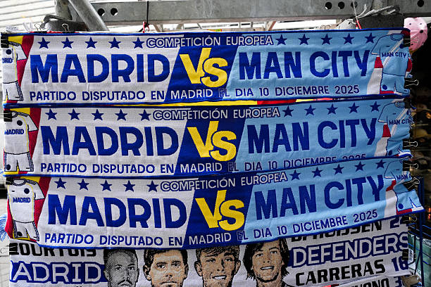 Real Madrid and Manchester City scarfs for sale near the Bernabeu Stadium, Madrid. Picture date: Tuesday December 9, 2025. (Photo by Mike Egerton/PA Images via Getty Images)