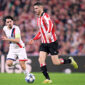 BILBAO, SPAIN - DECEMBER 10: (L-R) Vitinha of Paris Saint Germain, Oihan Sancet of Athletic Club  during the UEFA Champions League  match between Athletic de Bilbao v Paris Saint Germain at the San Mames Stadium on December 10, 2025 in Bilbao Spain (Photo by Cesar Ortiz Gonzalez/Soccrates/Getty Images)