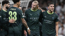 MADRID, SPAIN - DECEMBER 10: Manchester City's Erling Haaland (C) celebrates his goal with teammates during the UEFA Champions League Matchday 6 game against Real Madrid at Bernabeu Stadium in Madrid, Spain, on December 10, 2025. (Photo by Burak Akbulut/Anadolu via Getty Images)