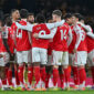 LONDON, ENGLAND - DECEMBER 13:  Arsenal players huddle during the Premier League match between Arsenal and Wolverhampton Wanderers at Emirates Stadium on December 13, 2025 in London, England. (Photo by Vince Mignott/MB Media/Getty Images)