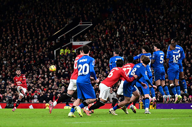MANCHESTER, ENGLAND - DECEMBER 15:   Bruno Fernandes of Manchester United scores his side's third goal during the Premier League match between Manchester United and Bournemouth at Old Trafford on December 15, 2025 in Manchester, England. (Photo by Richard Martin-Roberts - CameraSport via Getty Images)