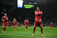Liverpool's French striker #22 Hugo Ekitike strikes a pose as he celebrates scoring their second goal for 0-2 during the English Premier League football match between Tottenham Hotspur and Liverpool at the Tottenham Hotspur Stadium in London, on December 20, 2025. (Photo by JUSTIN TALLIS / AFP via Getty Images) / RESTRICTED TO EDITORIAL USE. No use with unauthorized audio, video, data, fixture lists, club/league logos or 'live' services. Online in-match use limited to 120 images. An additional 40 images may be used in extra time. No video emulation. Social media in-match use limited to 120 images. An additional 40 images may be used in extra time. No use in betting publications, games or single club/league/player publications. /