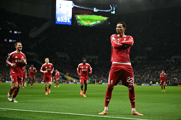 Liverpool's French striker #22 Hugo Ekitike strikes a pose as he celebrates scoring their second goal for 0-2 during the English Premier League football match between Tottenham Hotspur and Liverpool at the Tottenham Hotspur Stadium in London, on December 20, 2025. (Photo by JUSTIN TALLIS / AFP via Getty Images) / RESTRICTED TO EDITORIAL USE. No use with unauthorized audio, video, data, fixture lists, club/league logos or 'live' services. Online in-match use limited to 120 images. An additional 40 images may be used in extra time. No video emulation. Social media in-match use limited to 120 images. An additional 40 images may be used in extra time. No use in betting publications, games or single club/league/player publications. /