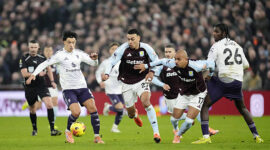 Manchester United's Lisandro Martinez (left) and Aston Villa's Morgan Rogers (second right) battle for the ball during the Premier League match at Villa Park, Birmingham. Picture date: Sunday December 21, 2025. (Photo by Nick Potts/PA Images via Getty Images)