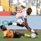 Mali's forward #17 Lassine Sinayoko (R) fights for the ball with Zambia's midfielder #17 Kings Kangwa (L) during the Africa Cup of Nations (AFCON) Group A football match between Mali and Zambia at Mohammed V Stadium in Casablanca, Morocco on December 22, 2025. (Photo by Abdel Majid BZIOUAT / AFP via Getty Images)