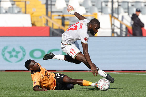Mali's forward #17 Lassine Sinayoko (R) fights for the ball with Zambia's midfielder #17 Kings Kangwa (L) during the Africa Cup of Nations (AFCON) Group A football match between Mali and Zambia at Mohammed V Stadium in Casablanca, Morocco on December 22, 2025. (Photo by Abdel Majid BZIOUAT / AFP via Getty Images)