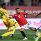 TOPSHOT - Egypt's forward #10 Mohamed Salah scores the team's second goal during the Africa Cup of Nations (CAN) group B football match between Egypt and Zimbabwe at Adrar Stadium in Agadir on December 22, 2025. (Photo by FRANCK FIFE / AFP via Getty Images)