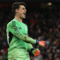 Arsenal's Spanish goalkeeper #13 Kepa Arrizabalaga celebrates saving the penalty of Crystal Palace's French defender #05 Maxence Lacroix to win the English League Cup quarter-final football match between Arsenal and Crystal Palace at the Emirates Stadium, in London on December 23, 2025. (Photo by Adrian Dennis / AFP via Getty Images) / RESTRICTED TO EDITORIAL USE. No use with unauthorized audio, video, data, fixture lists, club/league logos or 'live' services. Online in-match use limited to 120 images. An additional 40 images may be used in extra time. No video emulation. Social media in-match use limited to 120 images. An additional 40 images may be used in extra time. No use in betting publications, games or single club/league/player publications. /