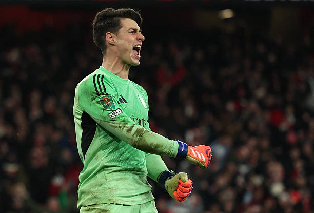 Arsenal's Spanish goalkeeper #13 Kepa Arrizabalaga celebrates saving the penalty of Crystal Palace's French defender #05 Maxence Lacroix to win the English League Cup quarter-final football match between Arsenal and Crystal Palace at the Emirates Stadium, in London on December 23, 2025. (Photo by Adrian Dennis / AFP via Getty Images) / RESTRICTED TO EDITORIAL USE. No use with unauthorized audio, video, data, fixture lists, club/league logos or 'live' services. Online in-match use limited to 120 images. An additional 40 images may be used in extra time. No video emulation. Social media in-match use limited to 120 images. An additional 40 images may be used in extra time. No use in betting publications, games or single club/league/player publications. /