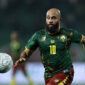 Cameroon's midfielder #10 Bryan Mbeumo runs with the ball during the Africa Cup of Nations (CAN) Group F football match between Cameroon and Gabon at Adrar Stadium in Agadir on December 24, 2025. (Photo by FRANCK FIFE / AFP via Getty Images)