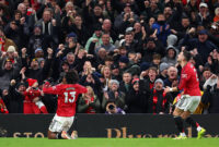 MANCHESTER, ENGLAND - DECEMBER 26: Patrick Dorgu of Manchester United celebrates scoring his team's first goal during the Premier League match between Manchester United and Newcastle United at Old Trafford on December 26, 2025 in Manchester, England. (Photo by Molly Darlington/Copa/Getty Images)