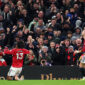 MANCHESTER, ENGLAND - DECEMBER 26: Patrick Dorgu of Manchester United celebrates scoring his team's first goal during the Premier League match between Manchester United and Newcastle United at Old Trafford on December 26, 2025 in Manchester, England. (Photo by Molly Darlington/Copa/Getty Images)