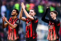 MILAN, ITALY - DECEMBER 28: David Odogu of AC Milan, Adrian Rabiot of AC Milan, Alexis Saelemaekers of AC Milan celebrating their sides win during the Serie A match between AC Milan and Hellas Verona FC at Giuseppe Meazza Stadium on December 28, 2025 in Milan, Italy. (Photo by Alberto Gandolfo/BSR Agency/Getty Images)