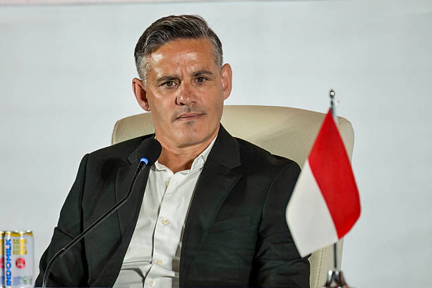 English manager John Herdman, new head coach of Indonesia's national football team, answers journalists' questions during a press conference in Jakarta on January 13, 2026. New Indonesia coach John Herdman on January 13 targeted qualification for the 2030 World Cup, warning there were no more excuses. Herdman comes in following the departure of Barcelona and Dutch great Patrick Kluivert, who left the Indonesia job after failing to get them to this year's World Cup. (Photo by BAY ISMOYO / AFP via Getty Images)
